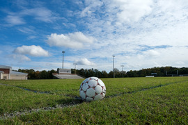 Soccer ball in a field at Manchester Athletics Complex