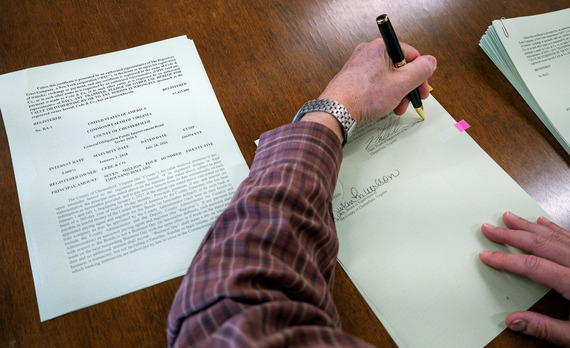 Miller Signs Bond Referendum