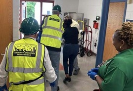 Members of Chesterfield's Community Emergency Response Team (CERT) respond during a training scenario
