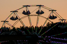 People ride a Ferris wheel at the Chesterfield County Fair