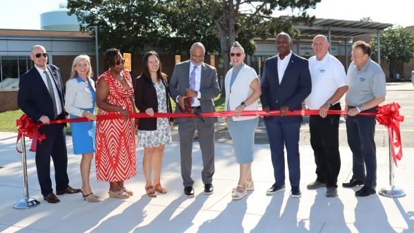 County and school leaders cut a ribbon to celebrate the opening of a renovated Career and Technical Center @ Hull