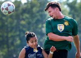 A Chesterfield first responder goes up for a header during the 2024 Community Cup