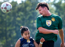 A Chesterfield first responder goes up for a header during the 2024 Community Cup
