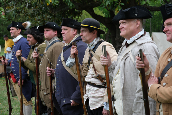 Revolutionary War reenactors with muskets at Historic Eppington