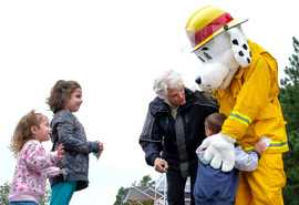 Sparky, the mascot for Chesterfield Fire and EMS, meets children at the 2025 Fire Prevention Week event