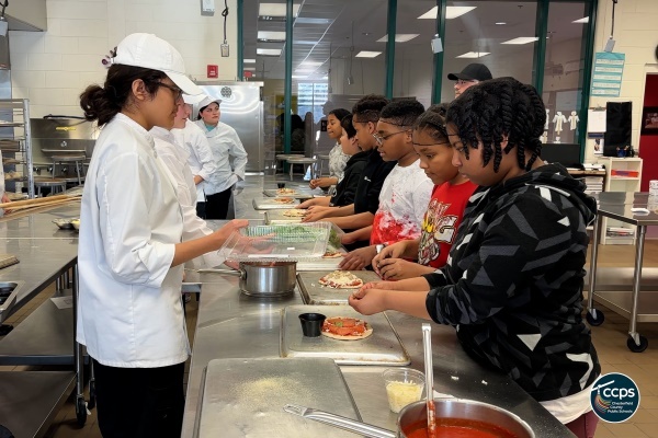 A student participates in a cooking class at the Chesterfield Career and Technical Center
