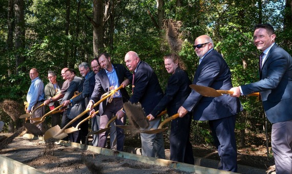 County, regional and state leaders toss shovels of dirt at a groundbreaking for the southern section of the Fall Line Trail