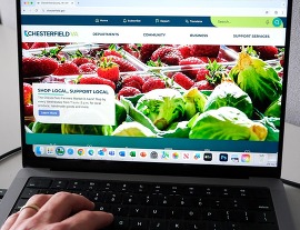 An image of a laptop computer displaying the homepage for Chesterfield's website