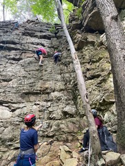 Students and mentors at rock climbing