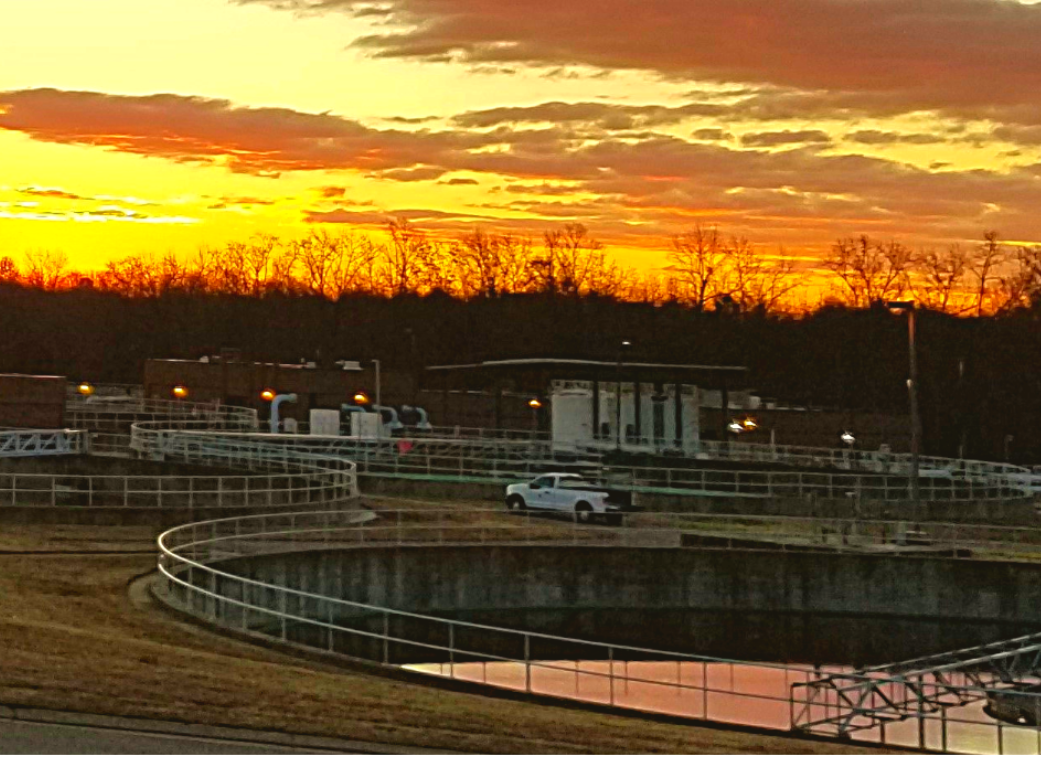 Water treatment facility at sunset