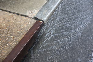 Stormwater moving into a sewer drain, considered nonpoint source. 