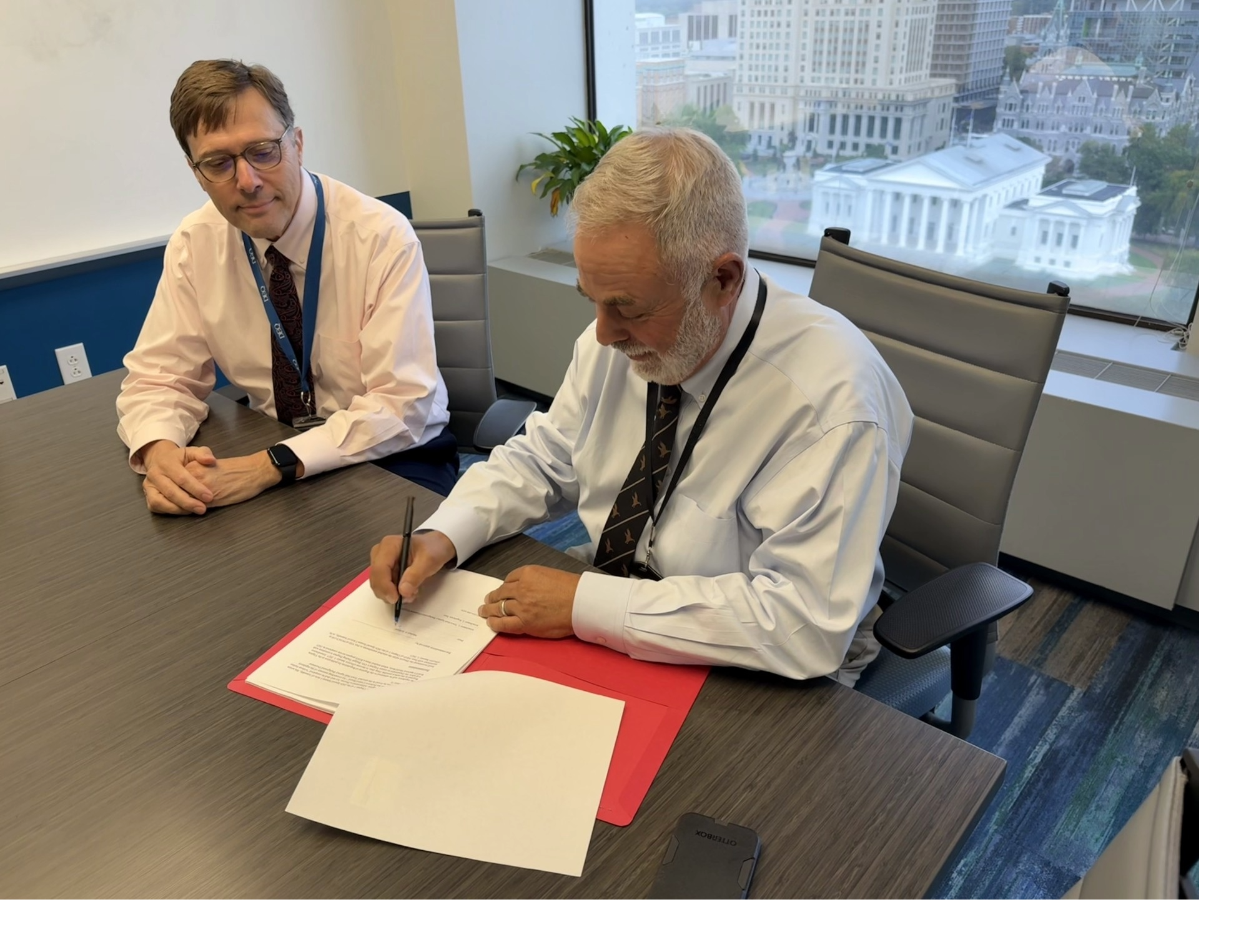 Director Rolband signing the Virginia CO2 Budget Trading Program rule