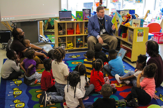Dr. Lane reads to students at MLK Preschool Center for Read Across America Day