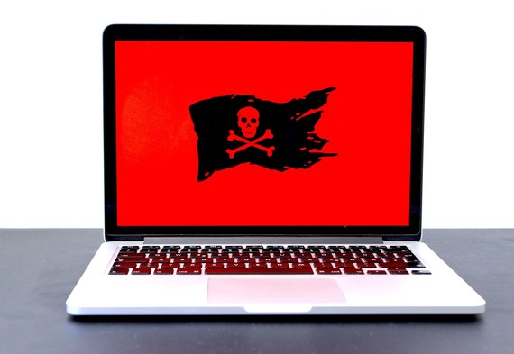 ransomware pirate flag on laptop
