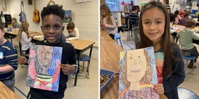 Two smiling students holding up hand drawn self portraits.
