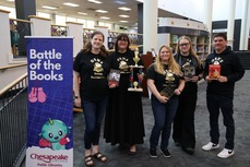 A group of smiling students who won the Battle of the Books