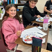 Students enjoying french snacks