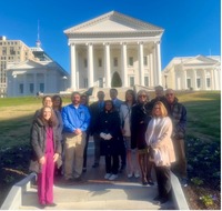 Honorees standing in front of the Virginia State Capitol