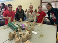 Student volunteers smiling