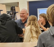 The Custodian, Hunter, spending time with students.