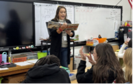 Teacher reading to class