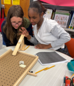 Students making a pinball machine