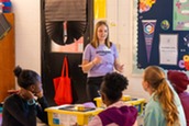 Visit from Amazon Think Big Experience speaking with students