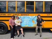 Teachers with the Book Bus and Math Mobile