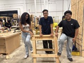 Students in a carpentry studio