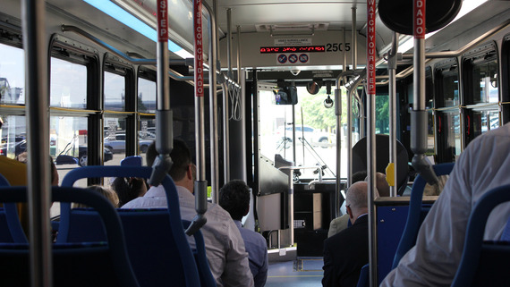 people sitting on HRT bus
