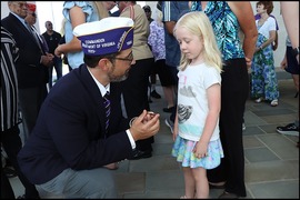 Ben King and Child at Purple Heart Day Ceremony