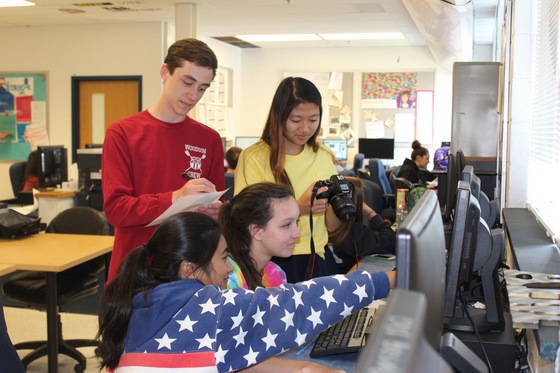 Photojournalism students in action