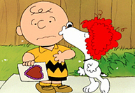 Snoopy kissing Charlie Brown