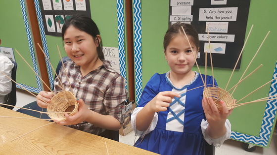 Students basket weaving