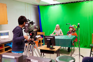 Photo of students filming the morning news