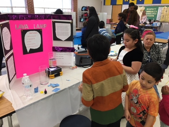Photo of students and guests participating in Science Night