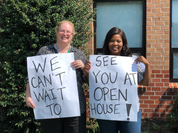 picture of administration with welcome sign