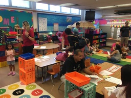Families in a classroom for open house