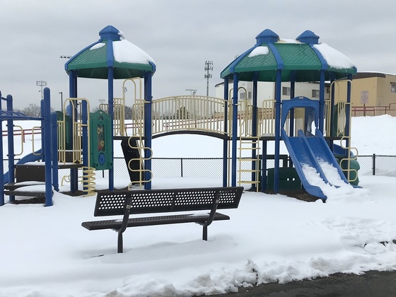 Photo of playground with snow
