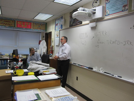 Picture of man presenting to students