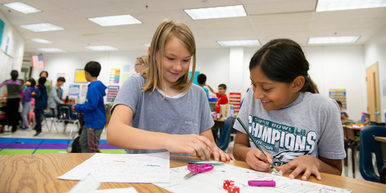 two students working at a desk