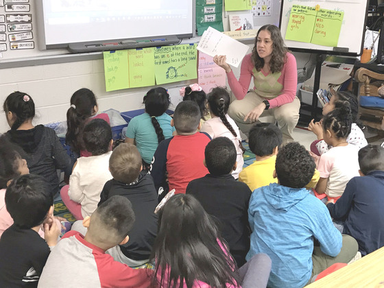 Photo of a first grade class in a reading lesson