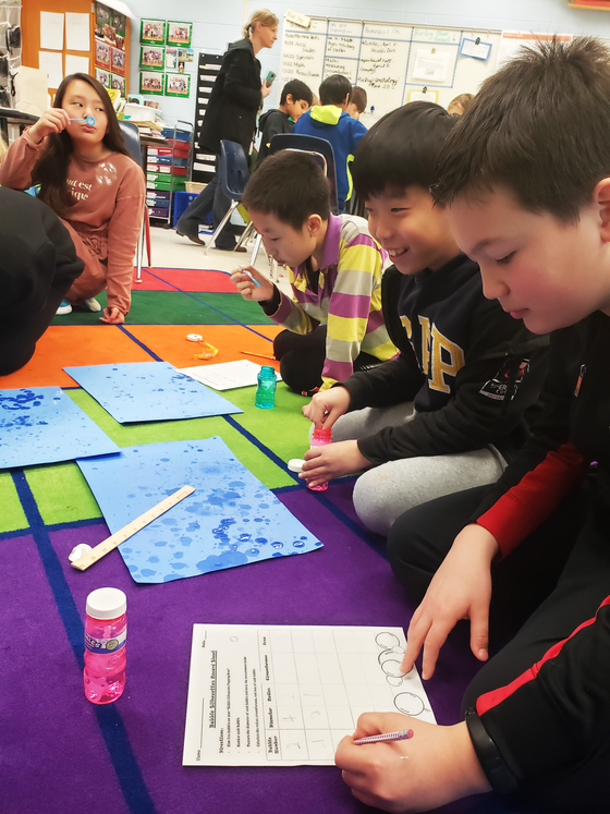 students studying Pi with bubbles