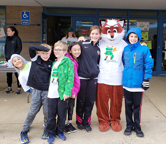 willow the mascot with students at the WSES leprechaun chase