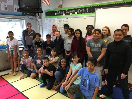 Photo of Ms. Plunkett and her students