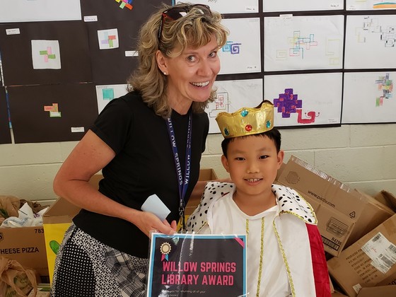 Miss Trogdon receives library reward