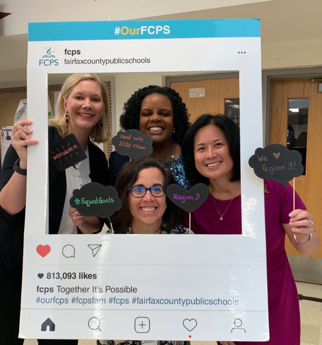 Region 3 staff holding #OurFCPS photo frame