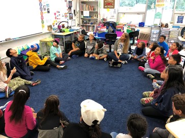 photo of students in a morning meeting
