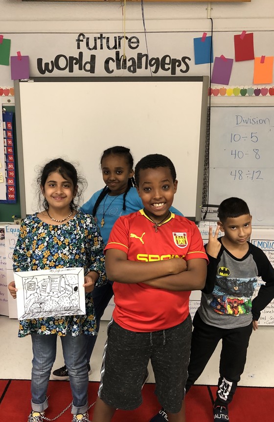 Photo of students preparing for upcoming presentations