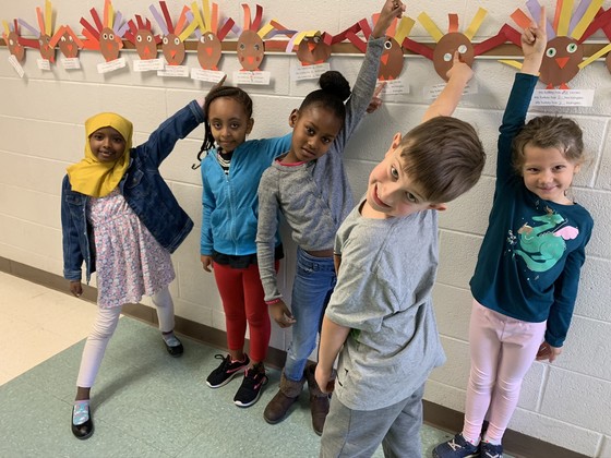 Photo of students with their projects